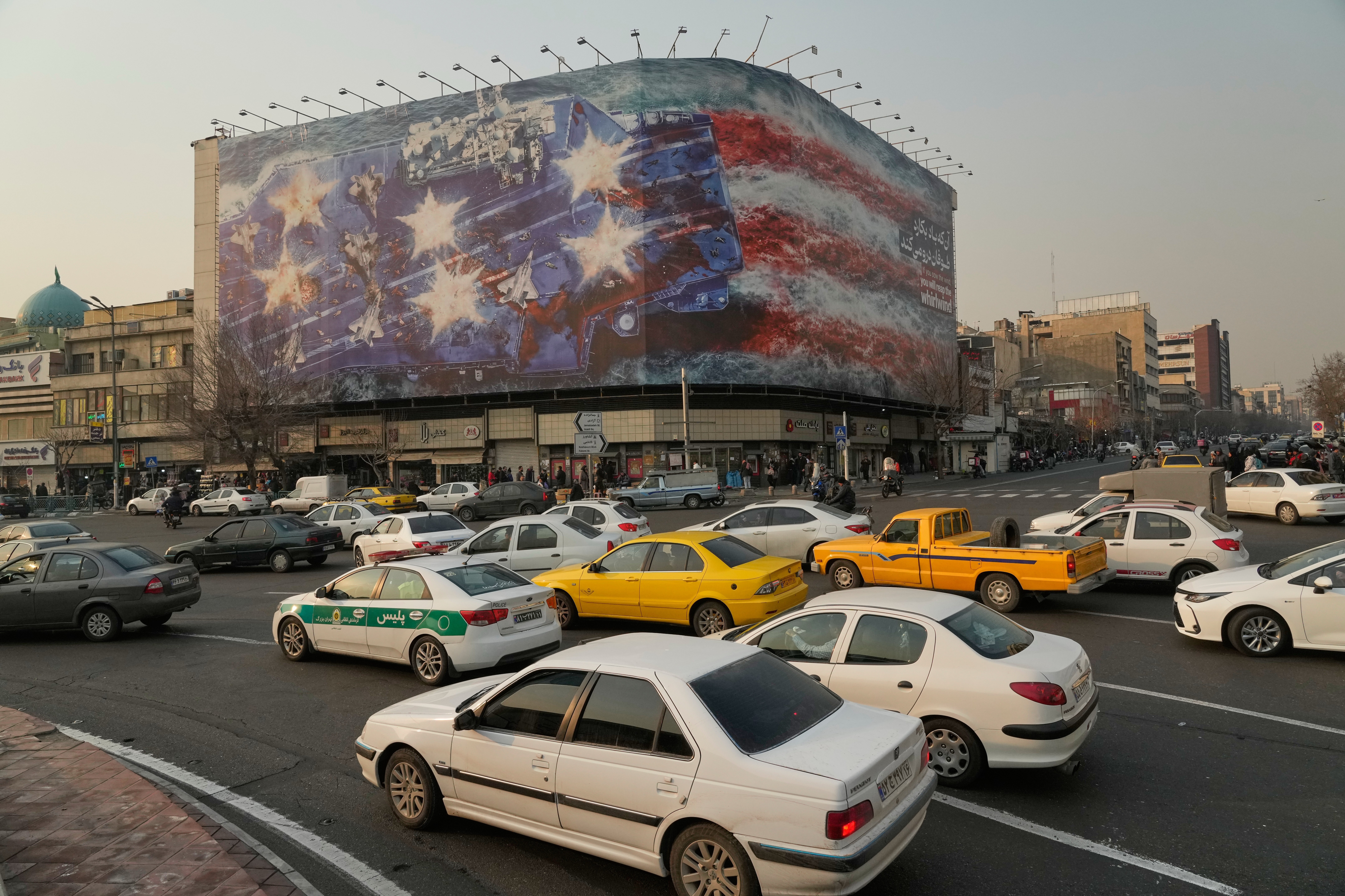 Iran unveils mural warning of retaliation if US military strike