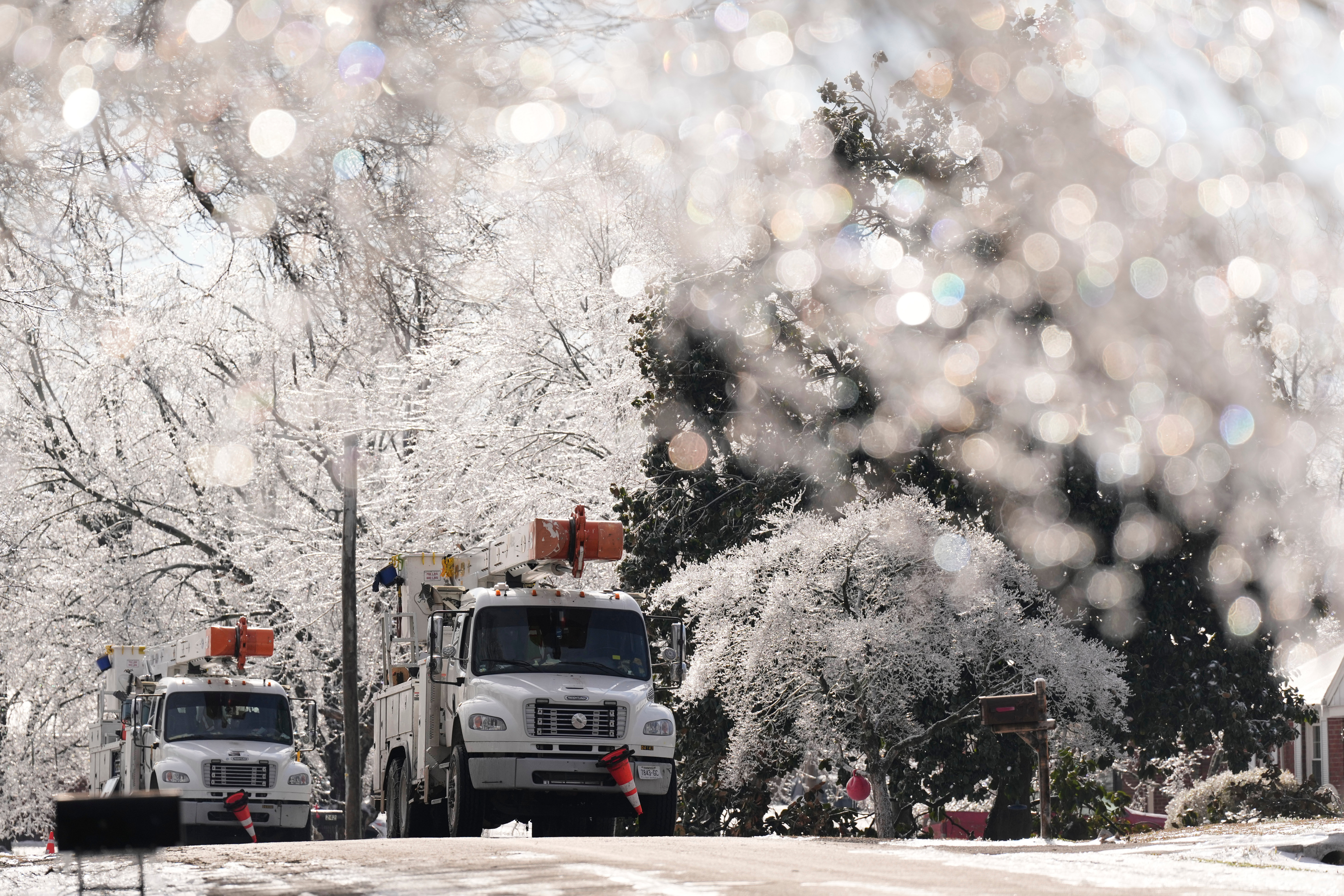 Crews race to restore power, open roads as another cold blast looms