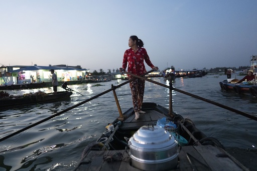 In Vietnam’s Mekong, lure of moving to city grows amid climate shocks
