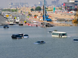 Cars are stranded on a flooded street in Dubai following heavy rains on April 18, 2024. Dubai's giant highways were clogged by flooding and its major airport was in chaos as the Middle East financial centre remained gridlocked on April 18, a day after the heaviest rains on record. uae ofws