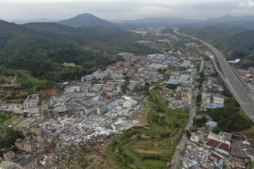 Aerial photos show wide devastation left by tornado in Guangzhou