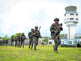 Soldiers conduct an airfield seizure exercise as part of the US-Philippines “Balikatan” joint military exercise at San Vicente Airport in Palawan province on Wednesday
