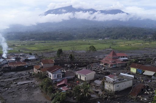 Indonesian rescuers search rivers, rubble after flash floods kill 50