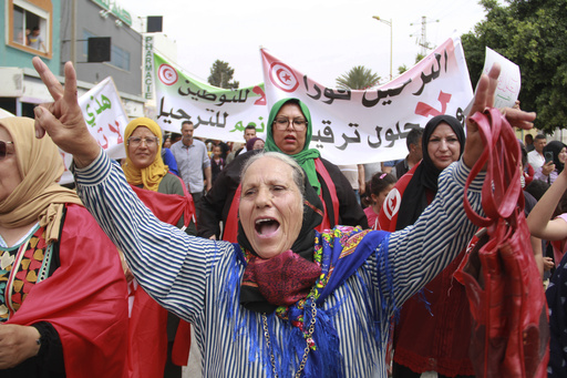 Tunisians protest as number of stranded in transit to Europe grows