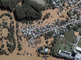 This handout satellite image courtesy of Maxar Technologies taken on May 7, 2024 shows the Taquari river after floodings in Taquari, Rio Grande do Sul state, Brazil.