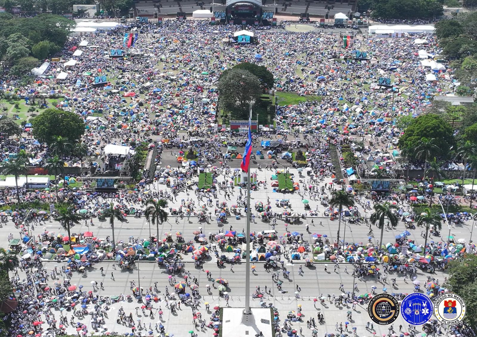 Tens of thousands rally in Manila over corruption scandal that implicates top execs